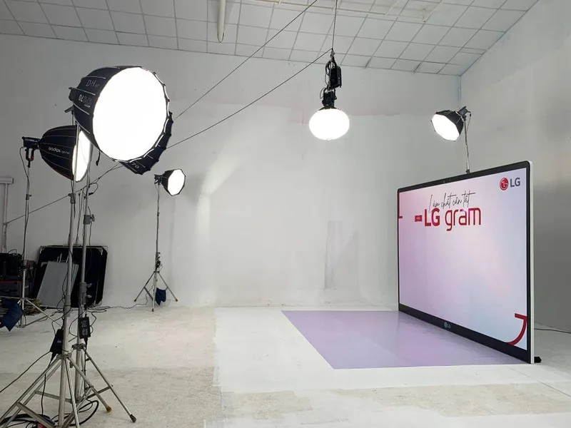 Photography lights and softboxes in a spacious white studio